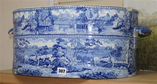 A 19th century Staffordshire blue and white foot bath (restored), with a small table